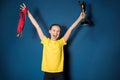 Excited girl with medals and trophy cup