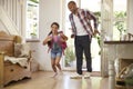 Excited Girl Returning Home From School With Mother Royalty Free Stock Photo