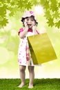 Excited girl and shopping bag