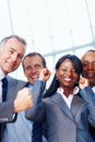 An excited group of business people enjoying success. Portrait of an excited group of business people enjoying success. Royalty Free Stock Photo