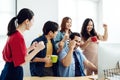 Young man and woman happy about good email news, motivated by great offer or new opportunity Royalty Free Stock Photo