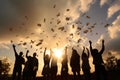 Excited group of people grabbing dollars in the air