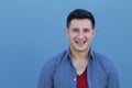 Excited guy against blue background - Stock image Royalty Free Stock Photo