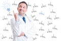 Excited handsome successful doctor pointing a great idea Royalty Free Stock Photo