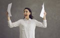 Excited happy casual woman entrepreneur reading good news in letter studio shot