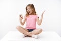 Excited happy cute teenage girl little bloger, thrilled see lots followers, raise hand cheerful amused, smiling broadly Royalty Free Stock Photo