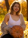 Excited happy fall woman smiling joyful outside in colorful fall forest. Beautiful Caucasian young woman Royalty Free Stock Photo