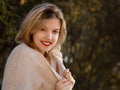 Excited happy fall woman smiling joyful outside in colorful fall forest. Beautiful Caucasian young woman Royalty Free Stock Photo