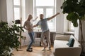 Excited happy senior couple dancing to music together Royalty Free Stock Photo