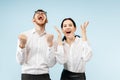 Excited happy young couple looking at camera with delight amazed by unbelievable great sale Royalty Free Stock Photo