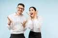 Excited happy young couple looking at camera with delight amazed by unbelievable great sale Royalty Free Stock Photo