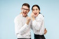 Excited happy young couple looking at camera with delight amazed by unbelievable great sale Royalty Free Stock Photo