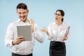 Excited happy young couple looking at camera with delight amazed by unbelievable great sale Royalty Free Stock Photo