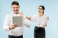 Excited happy young couple looking at camera with delight amazed by unbelievable great sale Royalty Free Stock Photo