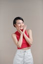 Excited happy young Indian woman expressing shock, with hands gestures Royalty Free Stock Photo