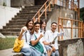 Excited high school student with fists looking at camera