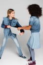 excited kid in stylish denim clothes