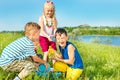 Excited kids pouring water Royalty Free Stock Photo