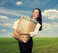 Excited laughing woman with money Royalty Free Stock Photo