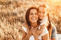 Happy daughter hugging mother in countryside Royalty Free Stock Photo