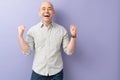 Excited man celebrating victory Royalty Free Stock Photo