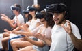 Excited man experiencing with friends virtual reality