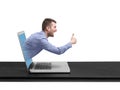 Excited man got out of the laptop Royalty Free Stock Photo