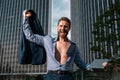 Excited man in shirt. Sexy businessman outdoors. Portrait of a mature strong businessman. Businessman walking Royalty Free Stock Photo