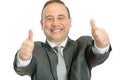 Excited mature businessman giving thumbs up signal Royalty Free Stock Photo