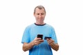 Online shopping, E-commerce concept. Middle aged man using phone browse and order products online. People staying home, buying Royalty Free Stock Photo