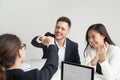 Excited multi-ethnic colleagues giving fist bump celebrating goo