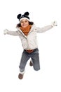 Excited primary girl jumping with joy Royalty Free Stock Photo