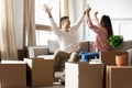 Excited husband and wife renters tenants celebrate moving day Royalty Free Stock Photo