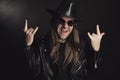 Excited rocker making rock hand gesture Royalty Free Stock Photo