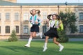 Excited school kids formal uniform running, hurry up concept