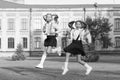 Excited school kids formal uniform running, hurry up concept