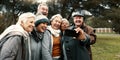 Excited, selfie and group of senior friends in outdoor green environment for fresh air. Diversity, happy and elderly Royalty Free Stock Photo