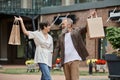 excited and senior couple holding shopping Royalty Free Stock Photo