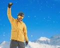 Excited snowboarder in the mountains Royalty Free Stock Photo