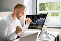 Excited Stock Market Broker Watching Screens Royalty Free Stock Photo