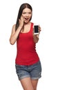 Excited surprised woman showing cell phone