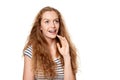 Excited teen girl looking to the side in amazement. Royalty Free Stock Photo