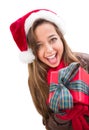 Excited Teen Wearing A Christmas Santa Hat with Bow Wrapped Gift Iisolat Royalty Free Stock Photo