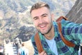 Excited tourist visiting the great wall of China Royalty Free Stock Photo