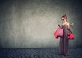 Happy woman with bags shopping online Royalty Free Stock Photo