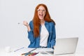 Excited and triumphing good-looking redhead female student passed challenge, found out final exam rating online using Royalty Free Stock Photo