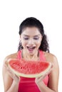 Excited woman eating juicy watermelon Royalty Free Stock Photo