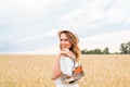 Excited woman holding new shoes that she found on sale Royalty Free Stock Photo