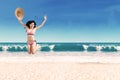 Excited woman leaping at beach 2 Royalty Free Stock Photo