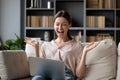 Excited woman looking at laptop screen, surprised by good news Royalty Free Stock Photo